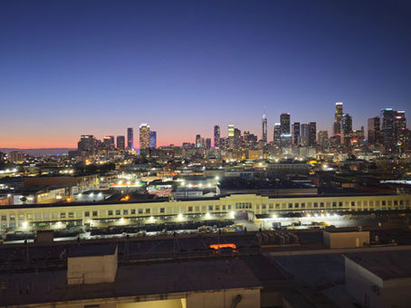 Downtown Los Angeles skyline viewed from Insurance-Fox office rooftop overlooking the produce wholesale district, serving who purchase their insurance for trucking, general liability, and commercial property