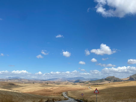 A winding road through the Sicilian countryside
