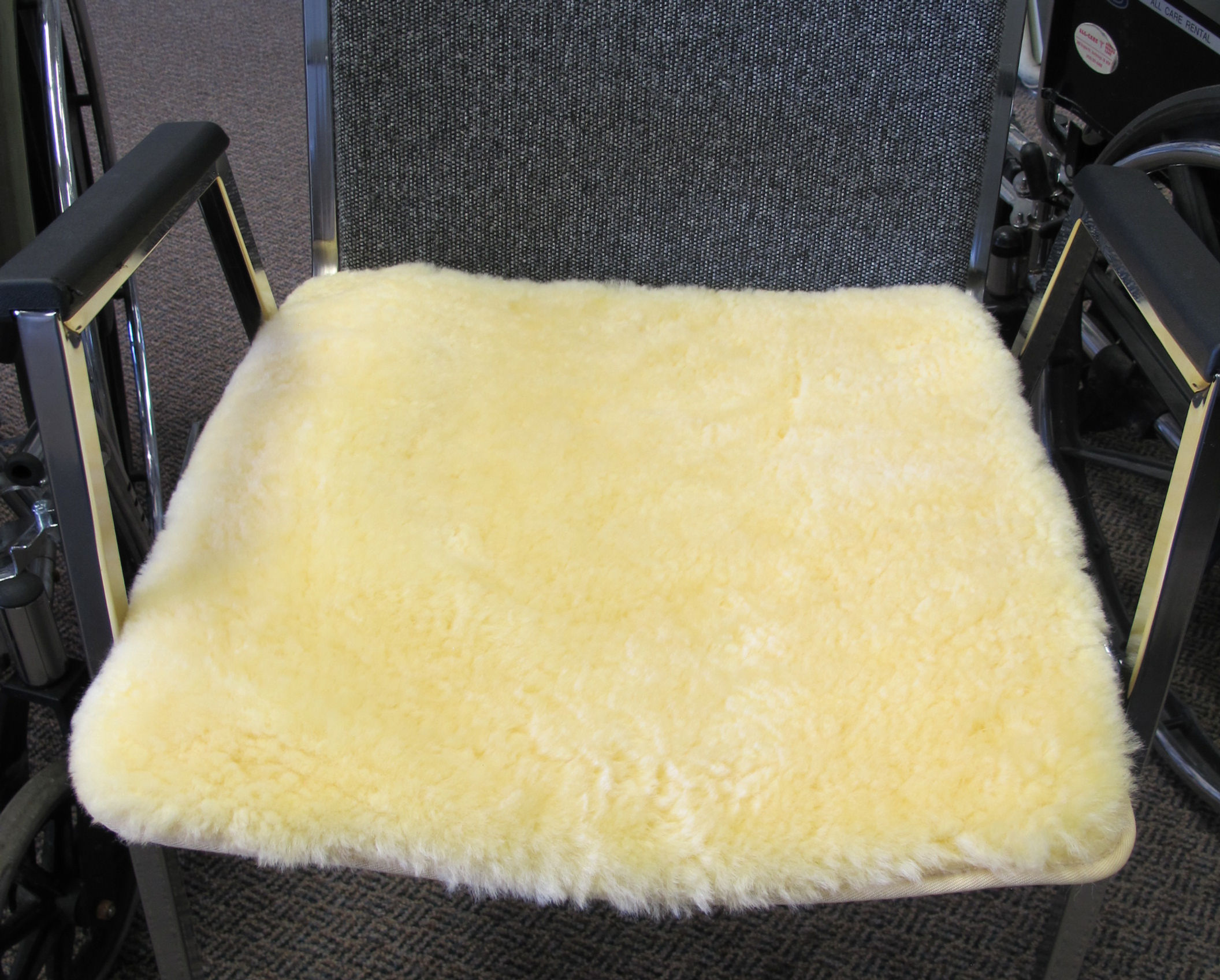 Wheelchair seat pad