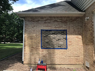 Gray brick stain on a house
