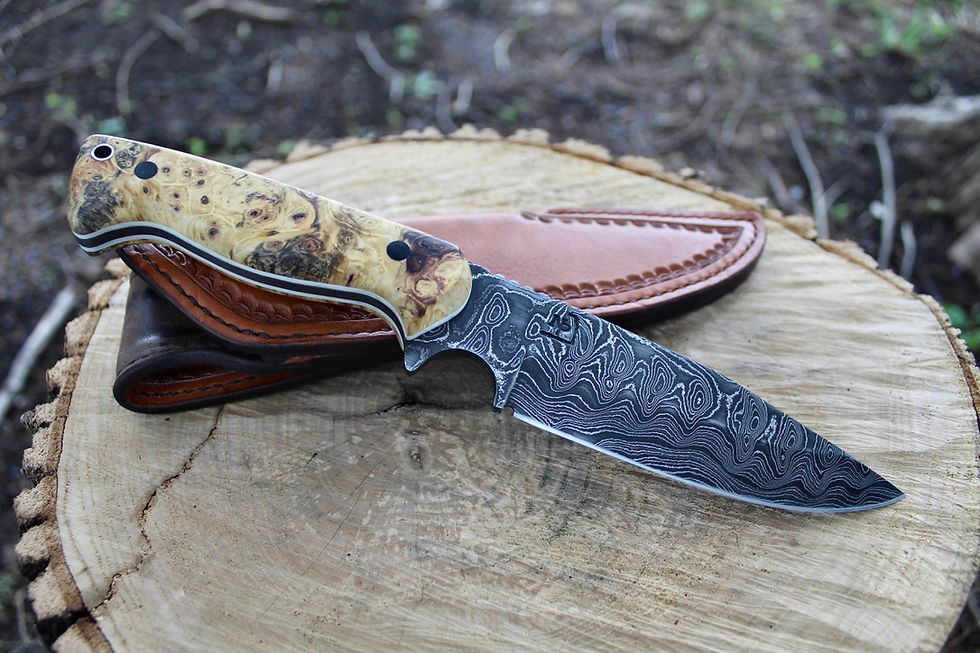 Damascus Blade - Buckeye Burl w/ White Spacer Handle