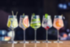 Five colorful gin tonic cocktails in win