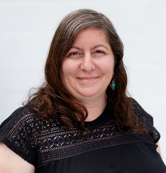 SideAPhoto_JoyHeadshot_5.jpg