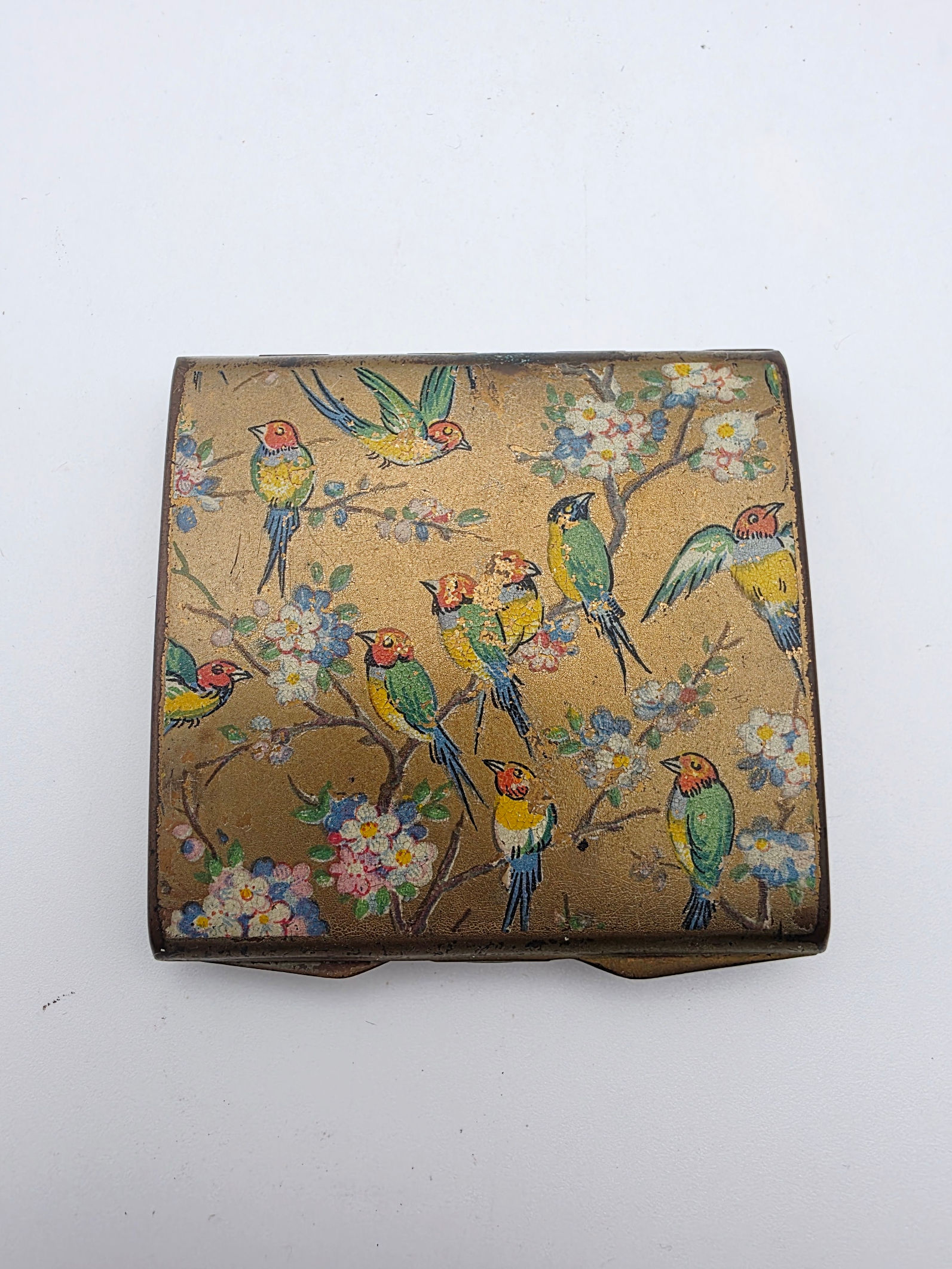 Mid-century Stratton square brass compact with colourful bird and blossom lid