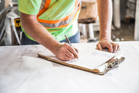 Worker signing forms.jpeg