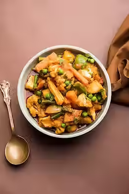 Here’s a simple and wholesome Mix Vegetable Poriyal recipe — a classic South Indian dry sabzi that’s light, flavourful, and spiced just right with a hint of hing (asafoetida).