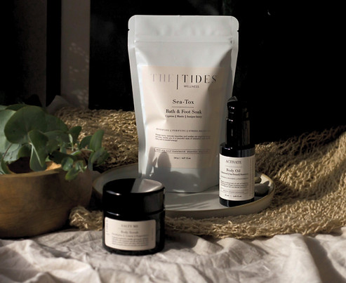 Skincare products in a golden hour lifestyle setting, showcasing natural beauty and wellness.