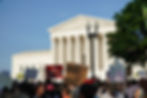 protestors protesting the Supreme Court's decision to ban abortions outside the Supreme Court building