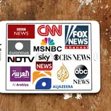 An ipad with logos of news networks on the screen