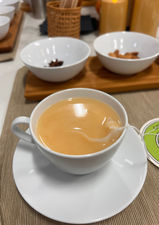 Hands-on herbal tea blending experience in Las Vegas with loose leaf herbs, flowers, and spices arranged for a guided tea workshop