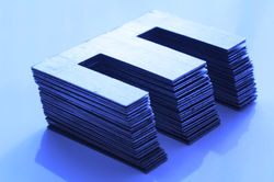 Ferromagnetic metal core for high energy efficient transformer