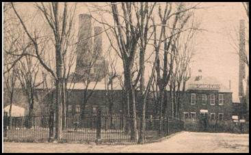St. John’s Park (Fountain Park) – note the fountain within the gated park. Boston & Sandwich Glass Factory in the background. Courtesy of Sandwich Town Archives.