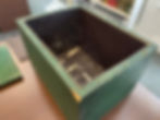 Sandwich’s 1876 time capsule, shown here in the Town Archives at the Sandwich Public Library, consists of a tin box surrounded by a wooden box, painted green. Unlike many time capsules, the Sandwich version survived its trip through time and delivered the goods on schedule. (Robert Thomson)