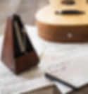 Guitar metronome and sheet music