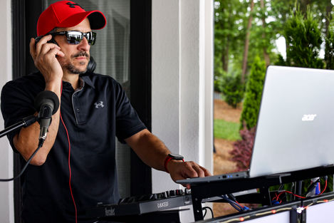 DJ Pete loading the next song for the drop!