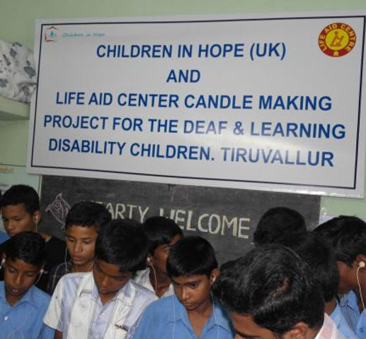 children with banner.JPG