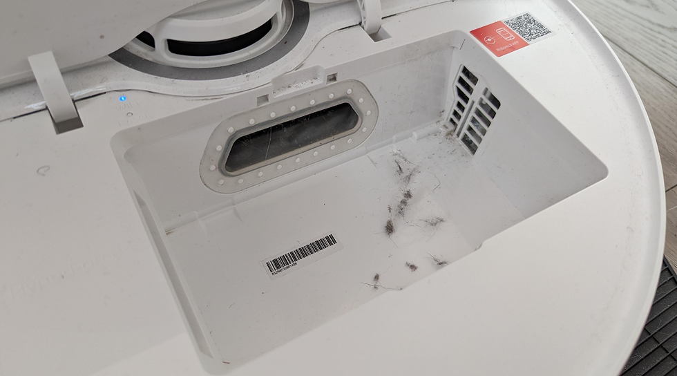 Check for and remove any debris obstructing the sensor or bin slot.