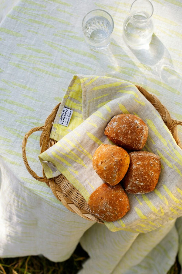 Thumbnail: LAPUAN KANKURIT Pure Linen  OSMANKÄÄMI Tablecloth + Throw available in linen-yellow from Iris Lifestyle Cambridge UK