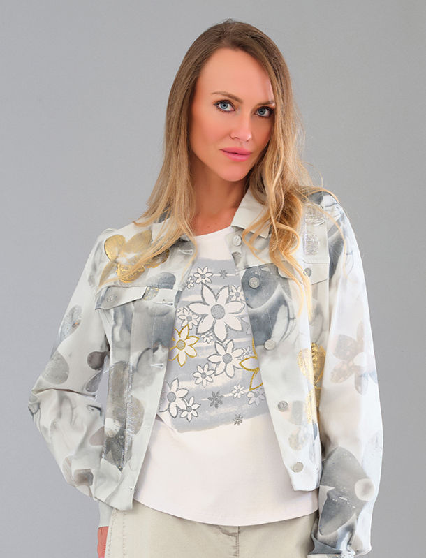 Chandail blanc cassé avec appliqué de marguerite sur fond argenté et doré vue de face