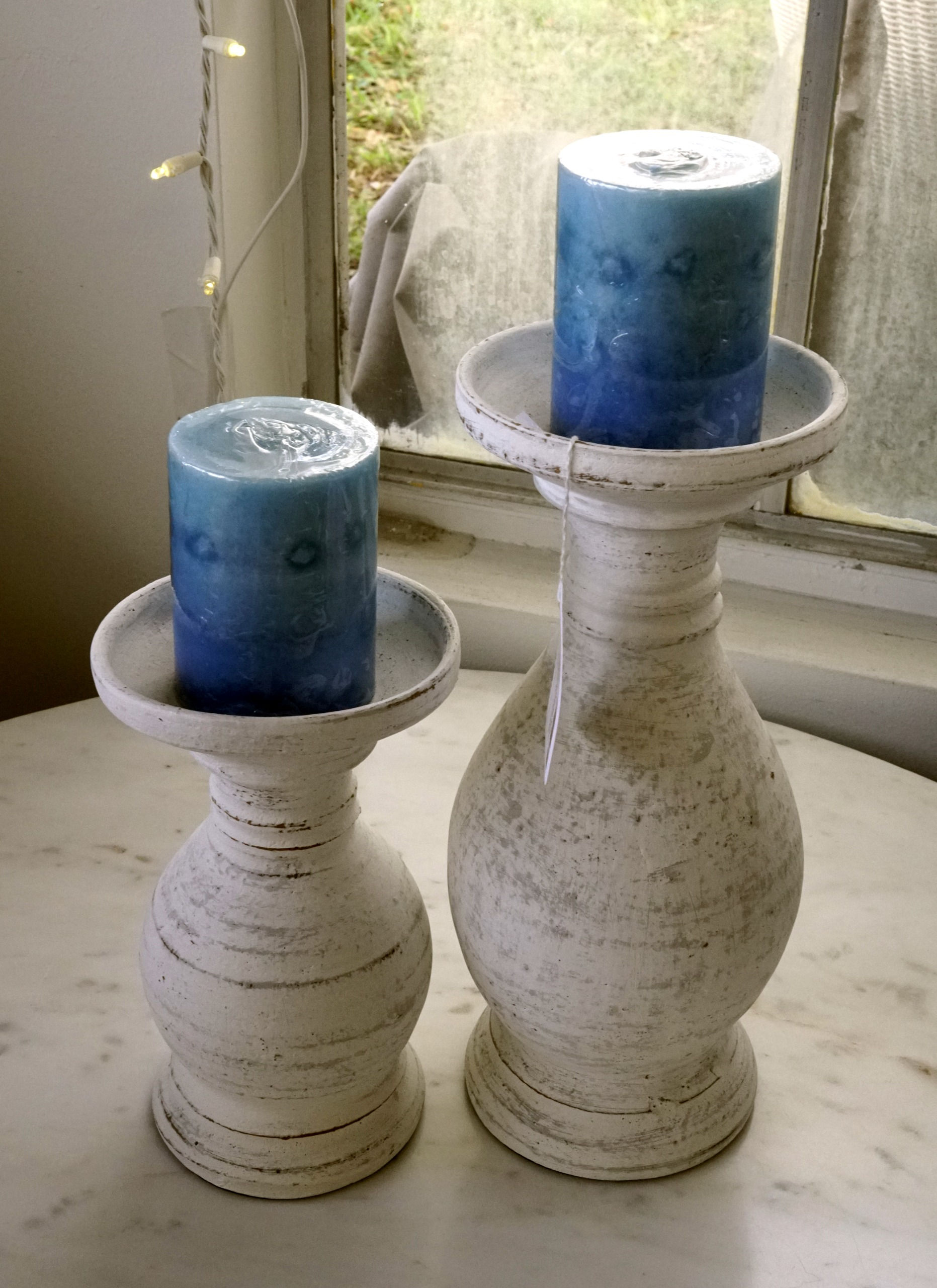 Pair of Washed White Pillar Candle Holders w/ Candles $24.99