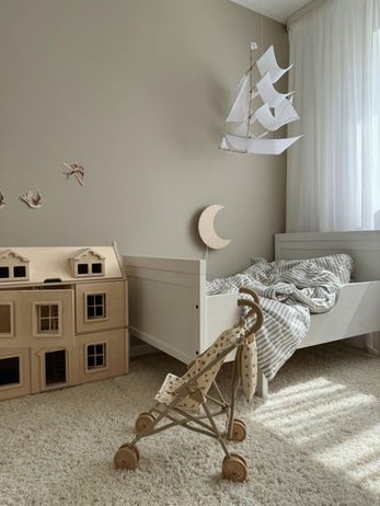 A beige carpet floor in a kids room.