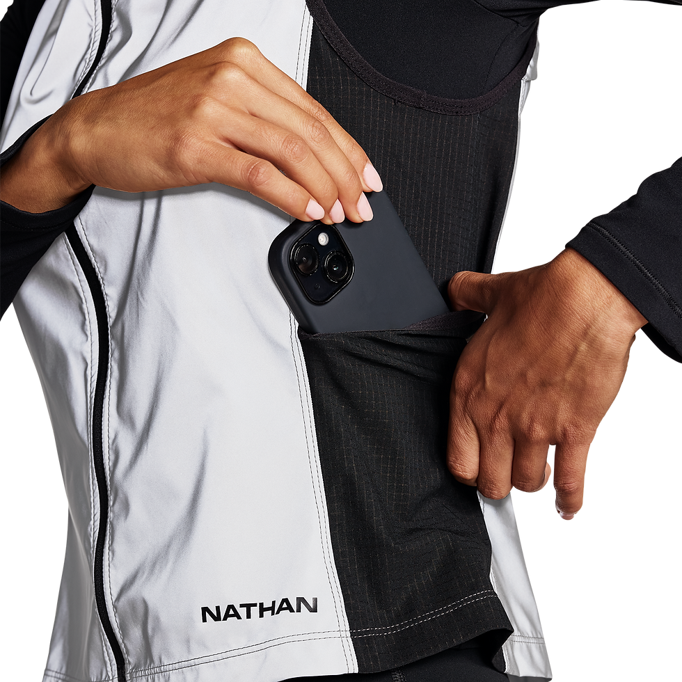 Side mesh insert and side pocket on the Nathan Hyper-Reflective Vest can easily stash a cell phone, gels and other items.