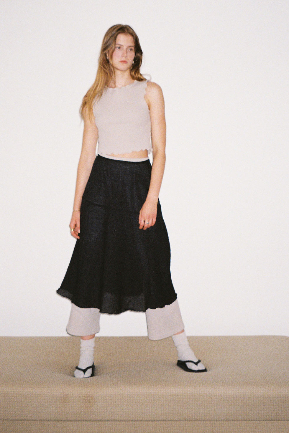 Thumbnail: Midi skirt crafted from black sheer lightweight cotton