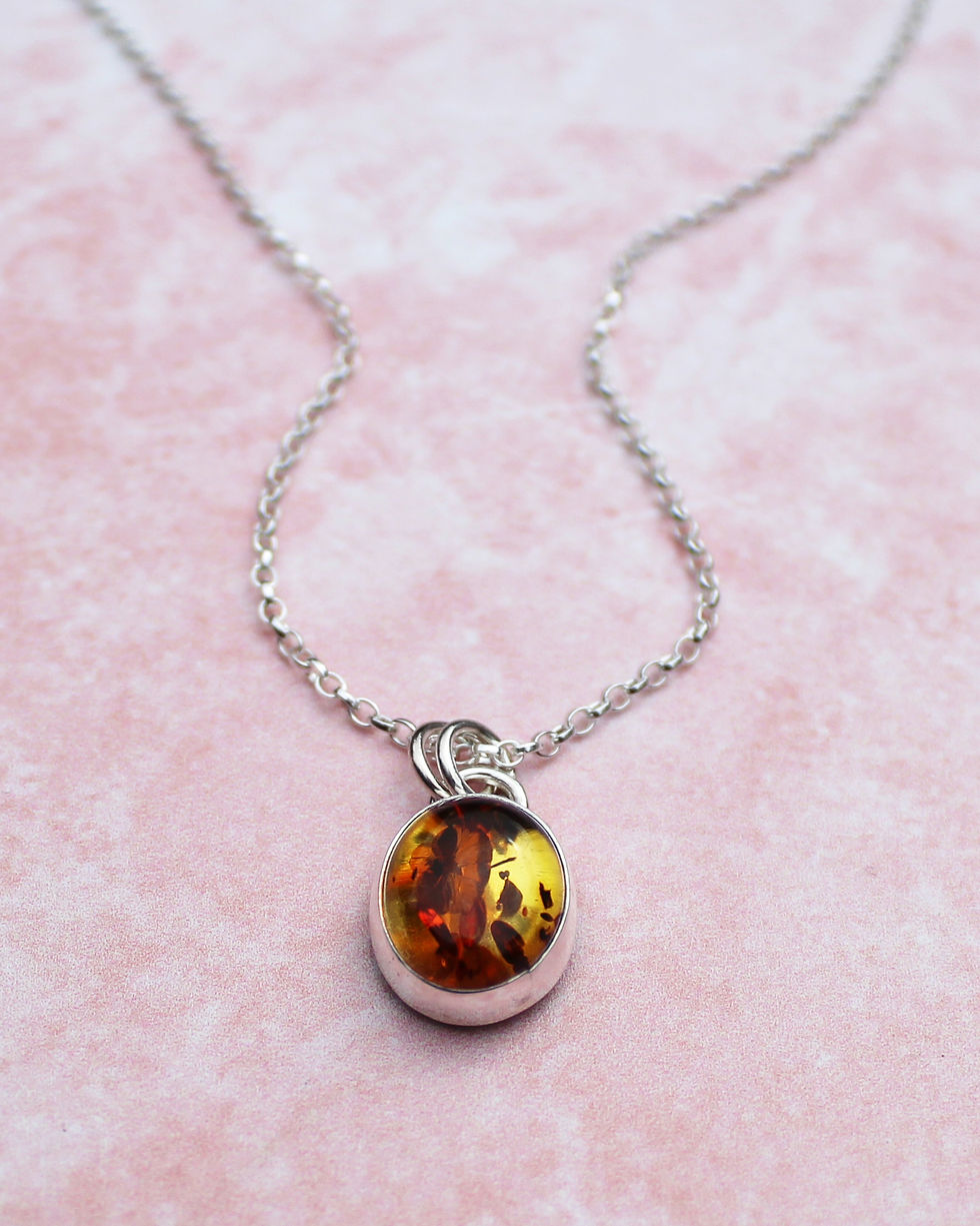 Thumbnail: Amber Oval Hidden Daisy Sterling Silver Necklace