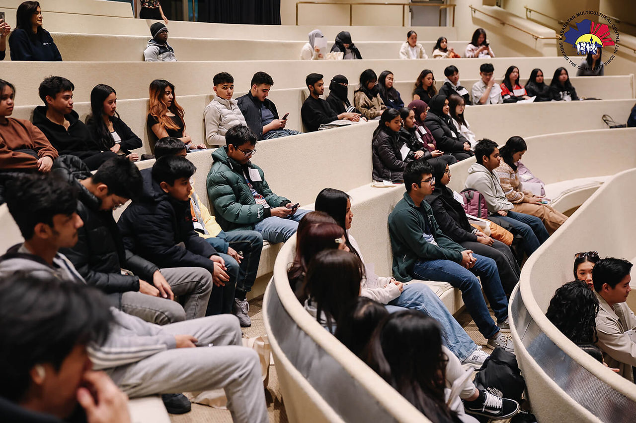Audience Listening to Panelists at the  NextGen Youth Summit 2025