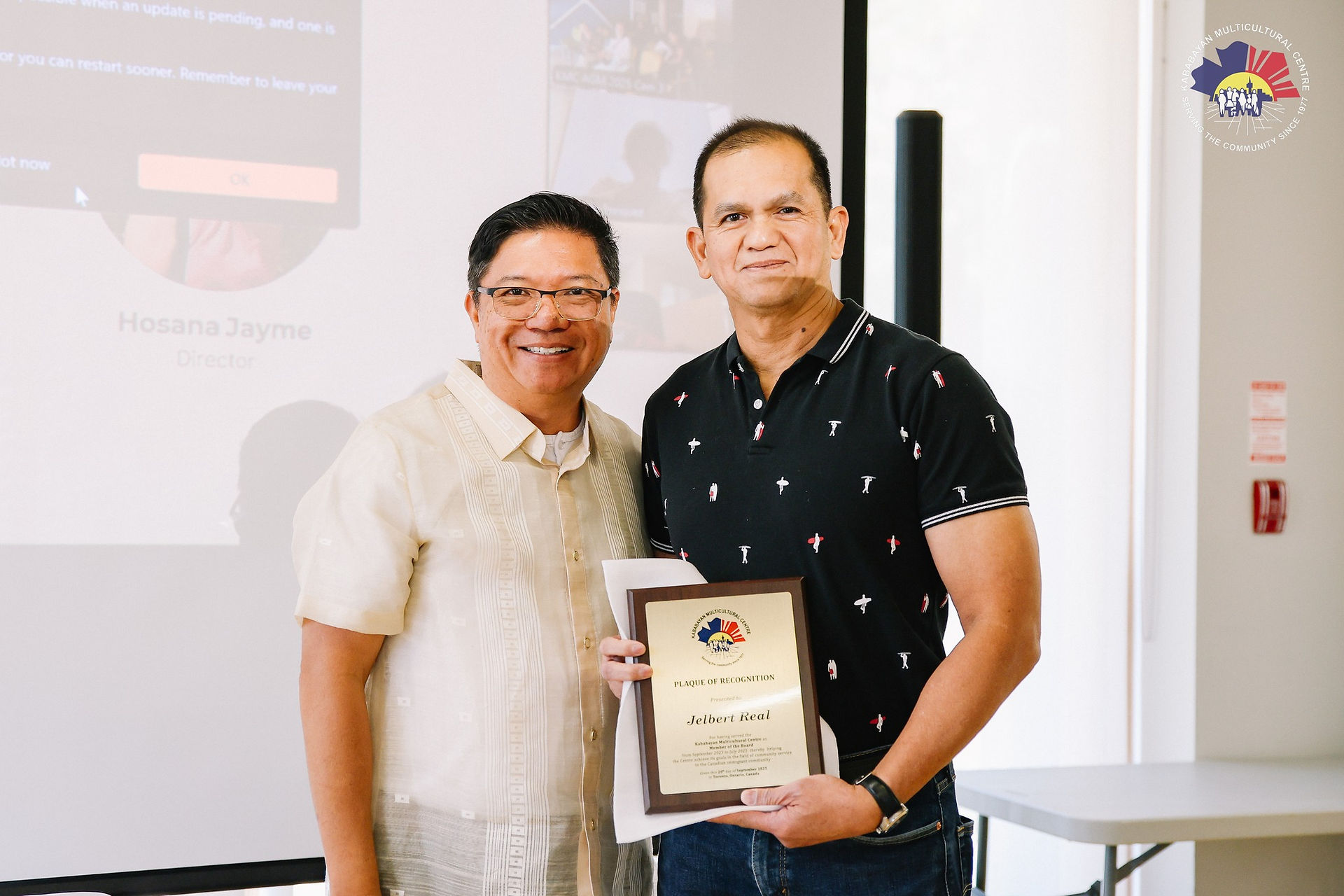 Ben Corpuz recognizes the outgoing Board Member, Jelbert Real