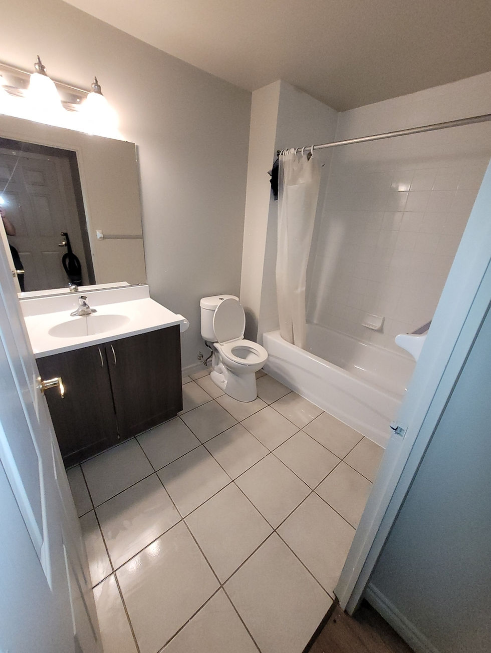 Clean apartment bathroom after professional deep cleaning services
