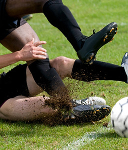 Soccer-slide-tackle-ankle-injury-scaled.jpeg