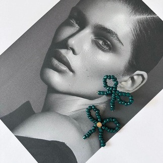 Close-up portrait highlighting necklace design and styling for brand content