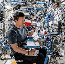 NASA astronaut Jonny Kim KJ5HKP using the radio on the ISS