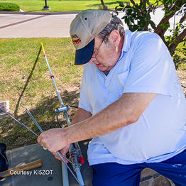 David Gilpin K5GIL working to assemble the awesome 2 meter antenna.