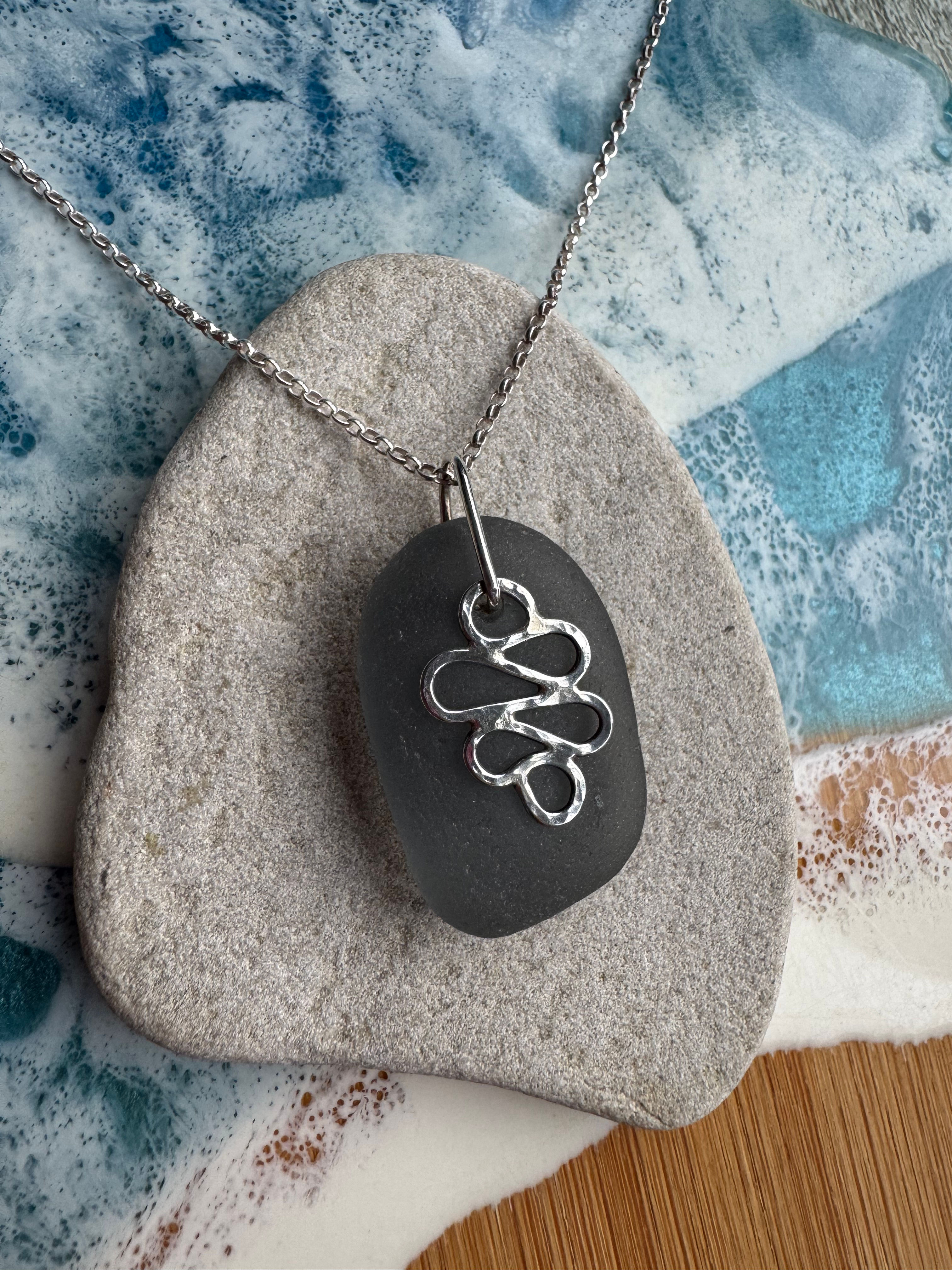 Seaglass and sterling silver swirl necklace.