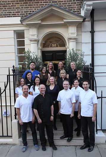 Plowman & Partners team outside 52
