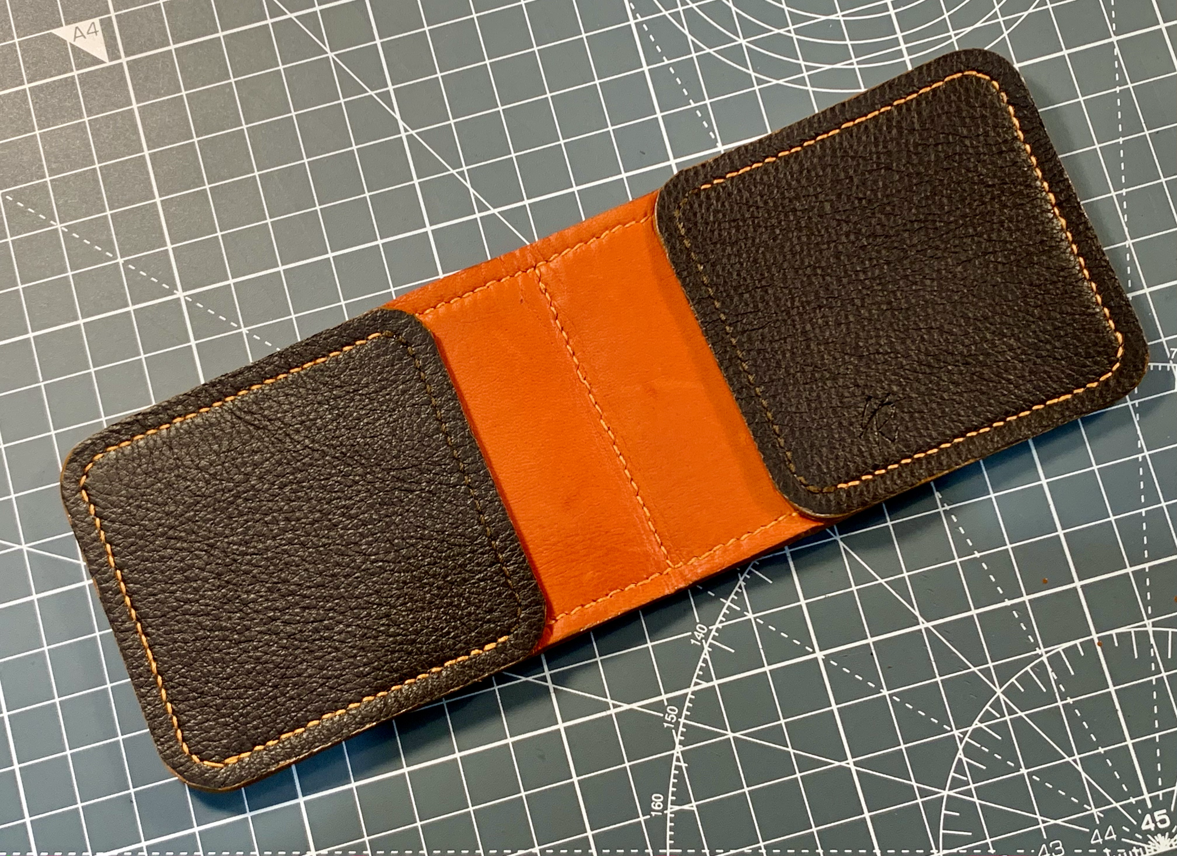 Folding card wallet (2 pocket) in soft tumbled calf lined with orange nappa