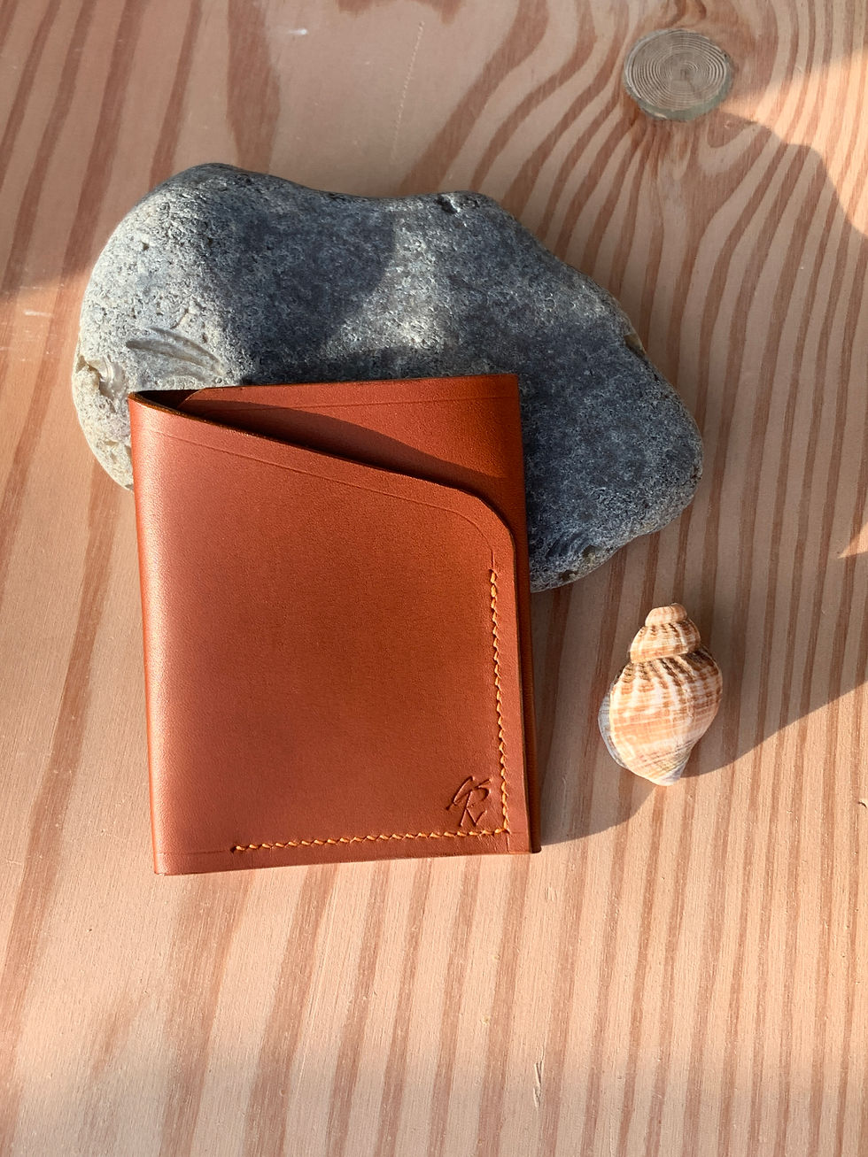 Thumbnail: Vertical card wallet (2 pocket) in folded chestnut hide with orange stitching