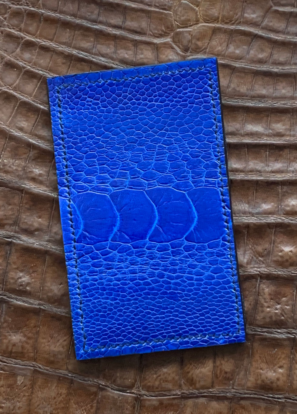 Thumbnail: Vertical card wallet (3 pocket) in cobalt blue glazed ostrich leg leather