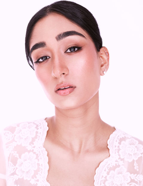 Luxury perfume campaign portraits photographed by Brisbane beauty photographer Jill Liu. Soft, feminine and editorial imagery created for fragrance brands, beauty campaigns and commercial storytelling.