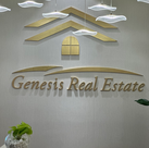 Reception logo wall in Genesis Real Estate office, Dubai