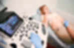 Pregnant woman undergoing a 12 week pregnancy scan