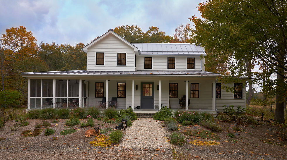 Modern farmhouse exterior with wraparound porch, Hudson Valley NY architectural photography