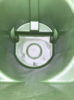 Clean And Sanitized Green Trash Bin | After