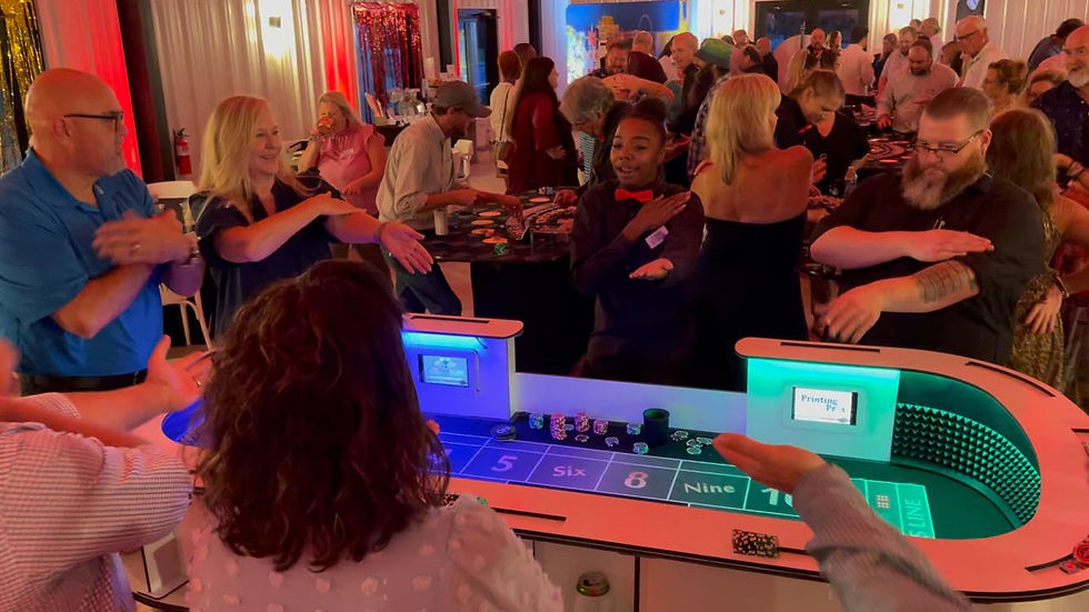 Guests dancing at a casino table