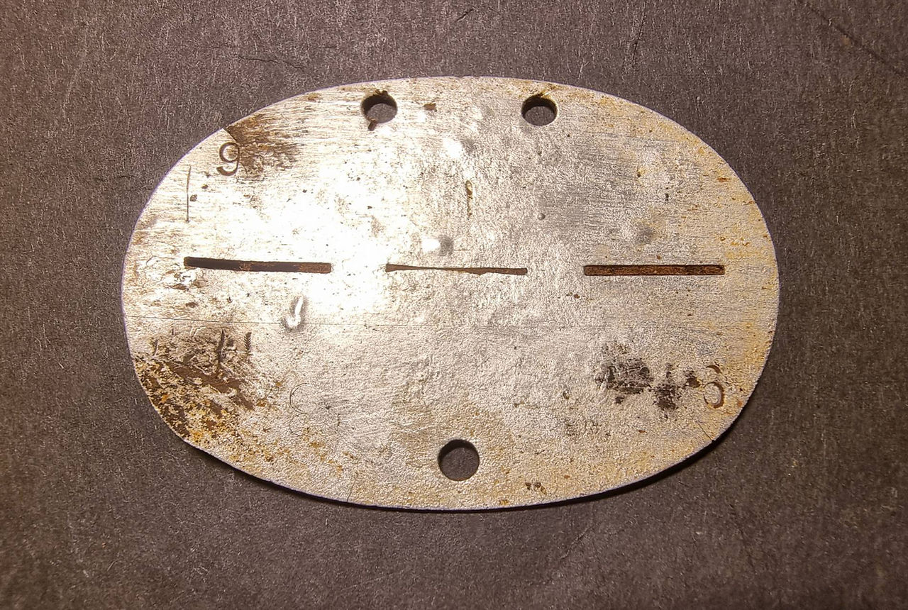 A 9 punched in on the backside.