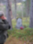 Former soviet pow visiting grave of his comrades