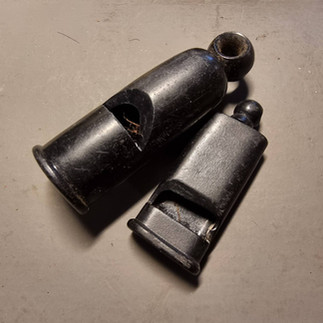 Two whistles.