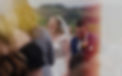 Bride and groom walking down aisle smiling from ear to ear after being married officially
